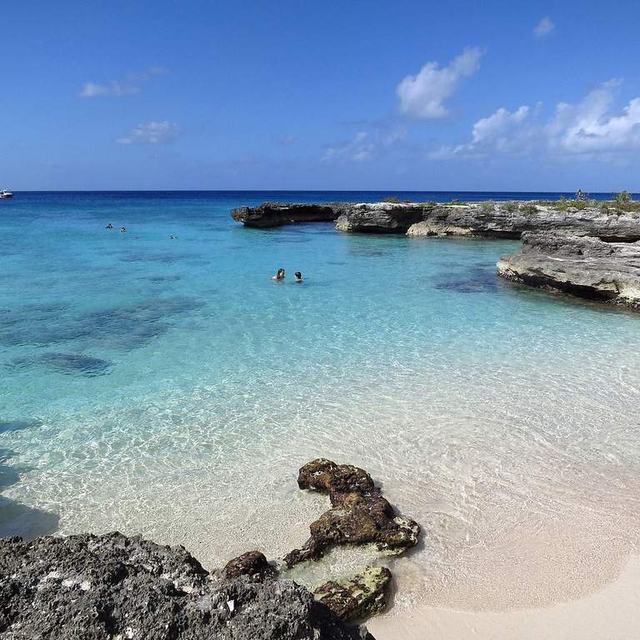 Turquoise cove with white sand